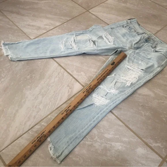 American Eagle TomGirl Super Distressed Light Blue Jeans Size 0 - Picture 11 of 12